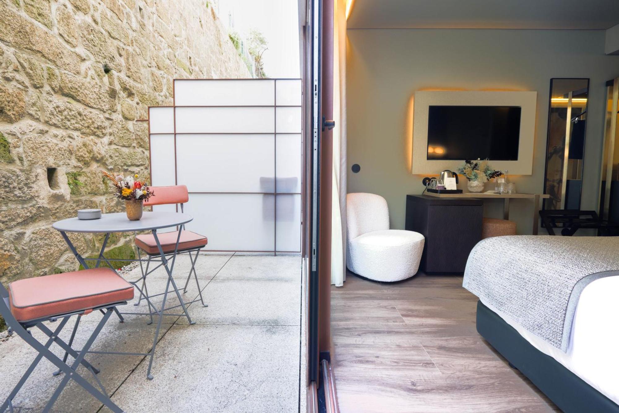 Timbre Virtudes Hotel ปอร์โต ภายนอก รูปภาพ A room at the hotel